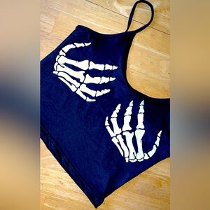 Size small fits like medium. Brand new as it’s too big for me. Black.